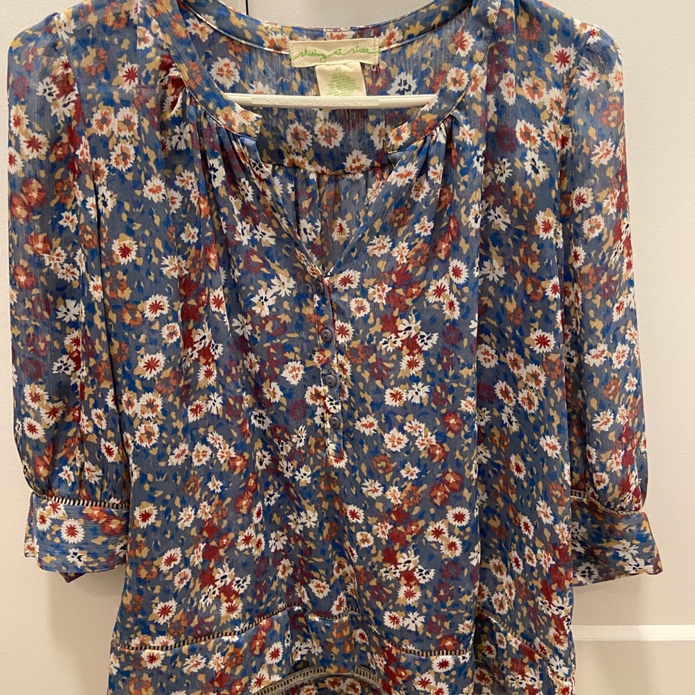 Loose fitted sheer floral top